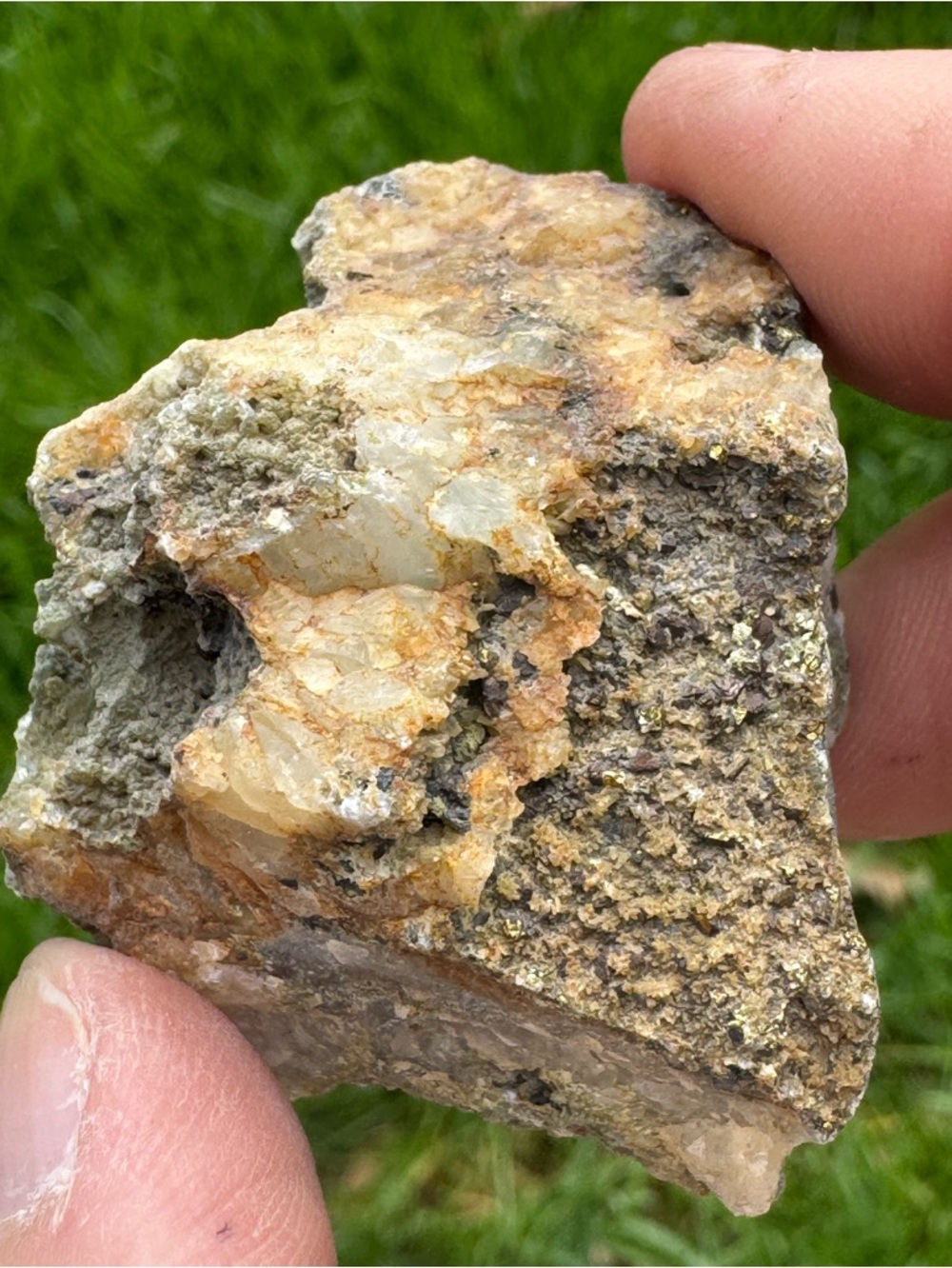 Gold ore w pyrite / pegmite / olivine or limonite heavy little chunk